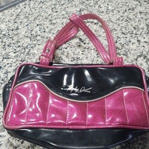 Trophy queen tuck and roll bag